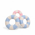 Liveify inflatable pool float rings in pastel blue, pink, and cream stripes for summer fun