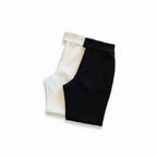 Liveify black and white color-blocked pants with sleek fabric and clean stitching detail