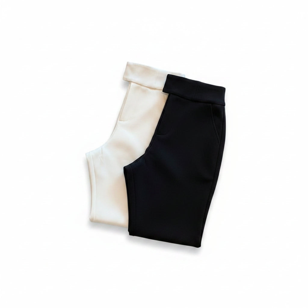 Liveify black and white color-blocked pants with sleek fabric and clean stitching detail