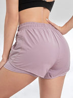 Liveify mauve athletic shorts with mesh side panels and elastic waistband for fitness