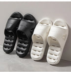 Liveify black and white home slippers with breathable holes and soft material for comfort
