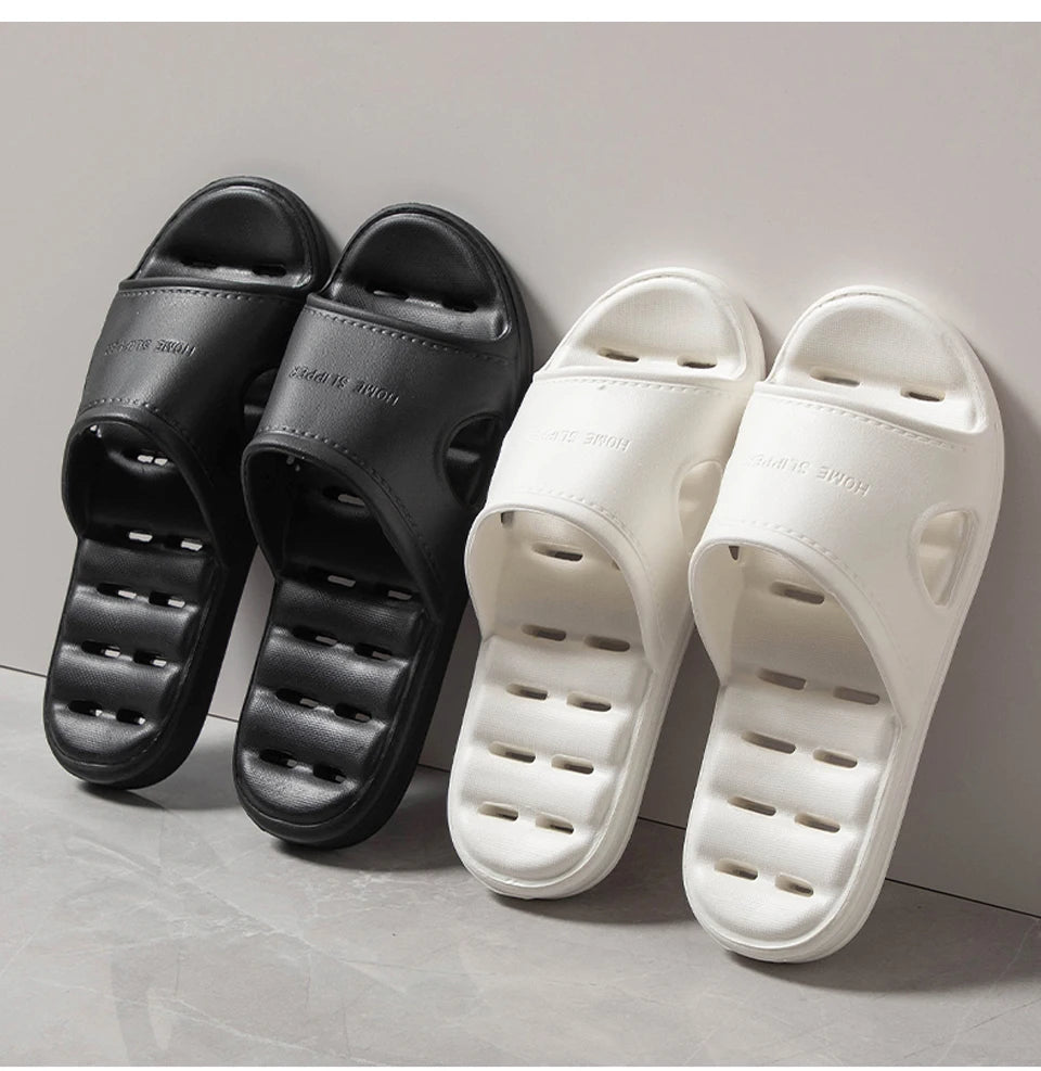 Liveify black and white home slippers with breathable holes and soft material for comfort