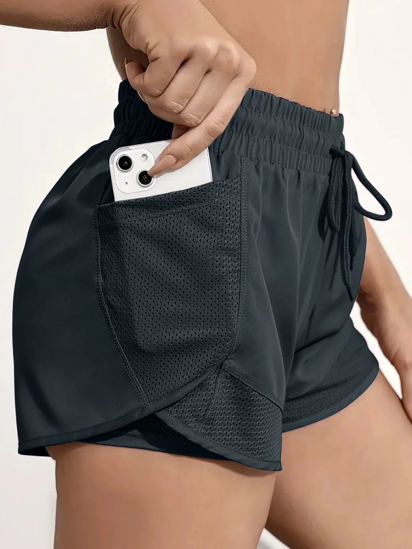 Liveify black mesh running shorts with phone pocket, drawstring waist, lightweight athletic wear for women
