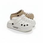 Liveify white and beige comfort clogs with perforated design and thick sole, ideal for casual wear