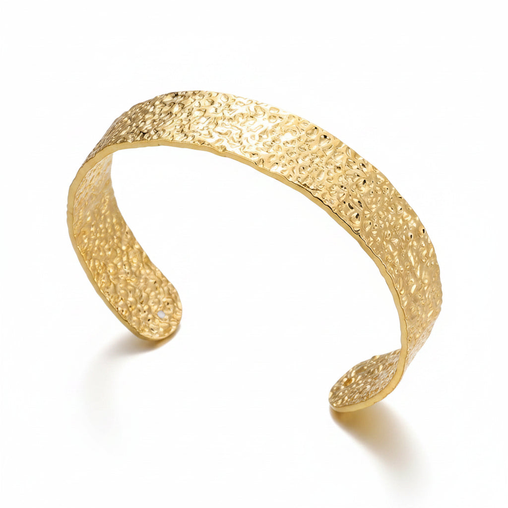 Liveify gold textured cuff bracelet with hammered finish, elegant women's fashion accessory on soft fabric