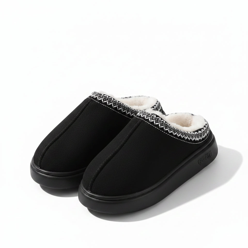 Liveify black cozy slippers with white faux fur lining and textured trim, perfect for home comfort.