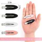 Liveify black and pink plastic hair clips with stainless steel clasp, 2.3in size, held in hand for scale