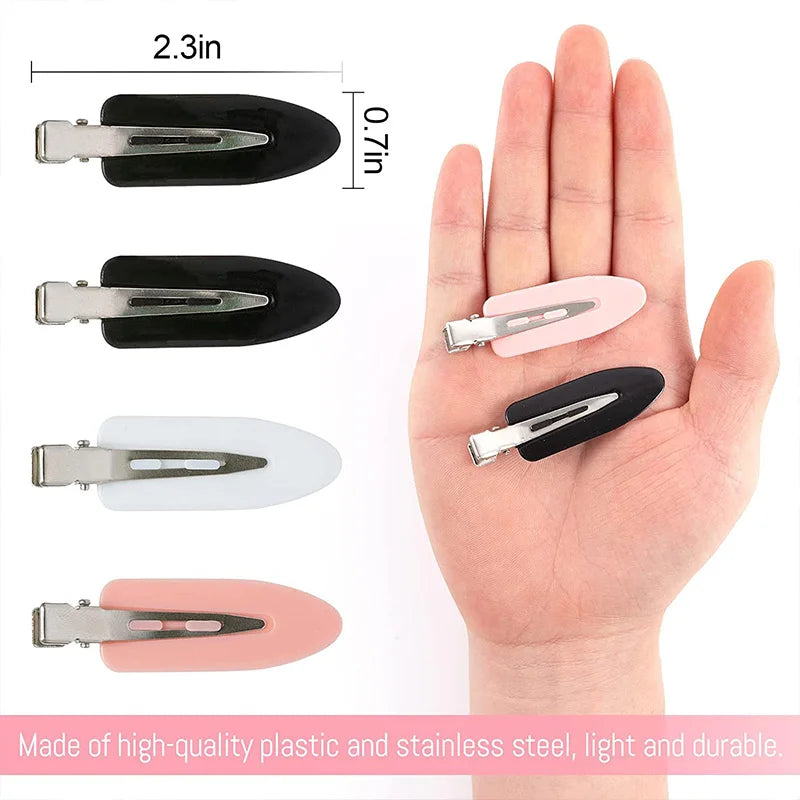 Liveify black and pink plastic hair clips with stainless steel clasp, 2.3in size, held in hand for scale