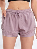 Liveify lavender mesh panel athletic shorts with drawstring waist, ideal for fitness and casual wear