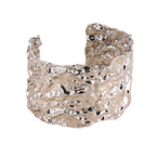 Liveify silver textured cuff bracelet with hammered finish, displayed on beige stone for modern fashion style