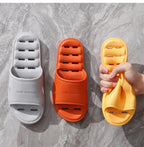 Liveify soft home slippers in white, orange, yellow with breathable holes, flexible material, and 'HOME SLIPPER' text