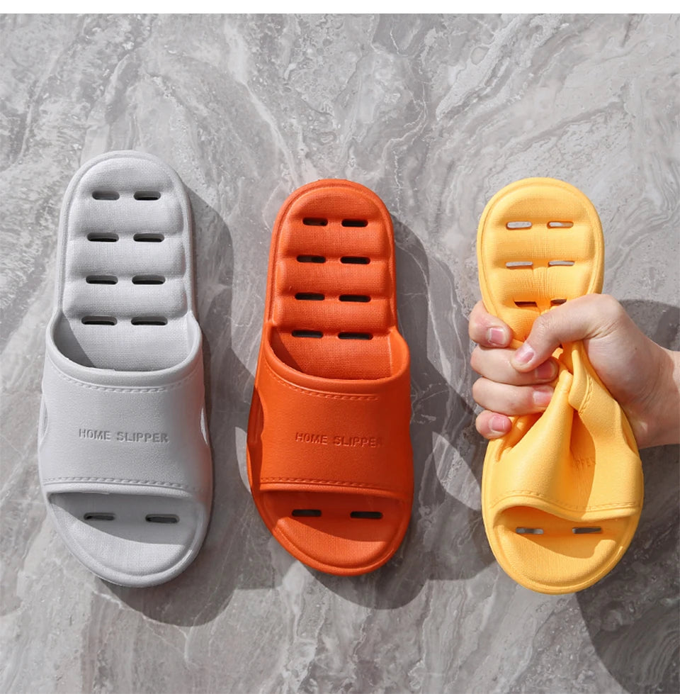 Liveify soft home slippers in white, orange, yellow with breathable holes, flexible material, and 'HOME SLIPPER' text