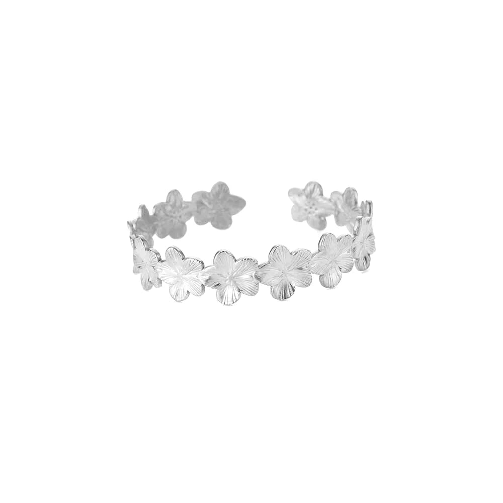 Liveify silver flower ring with delicate petal details, adjustable band, minimalist style