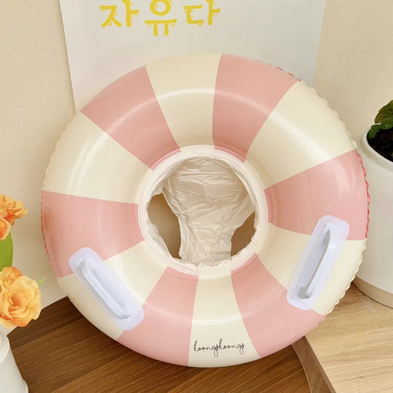 Liveify pink and cream striped inflatable pool float with white handles, stylish summer accessory for poolside relaxation