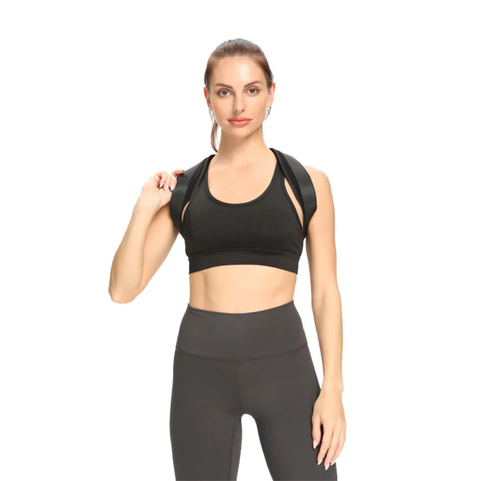 Liveify black sports bra with crisscross straps and high-waisted leggings for fitness workouts