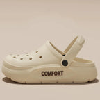 Liveify white comfort clog with perforated design and cushioned sole for casual wear