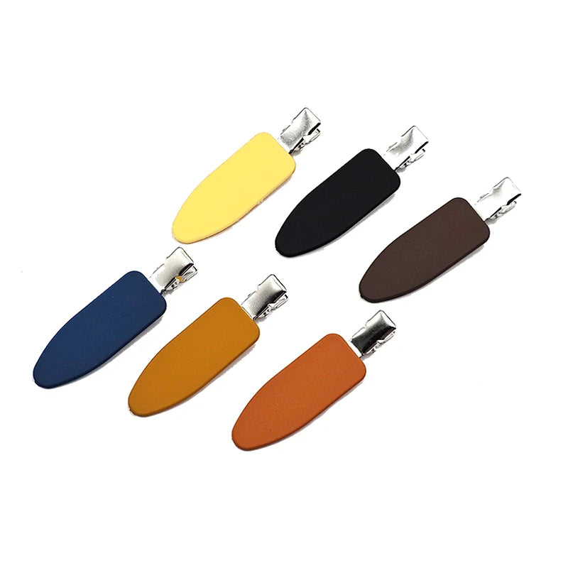 Liveify matte finish hair clips in yellow, black, brown, blue, orange, and rust with silver metal clasp