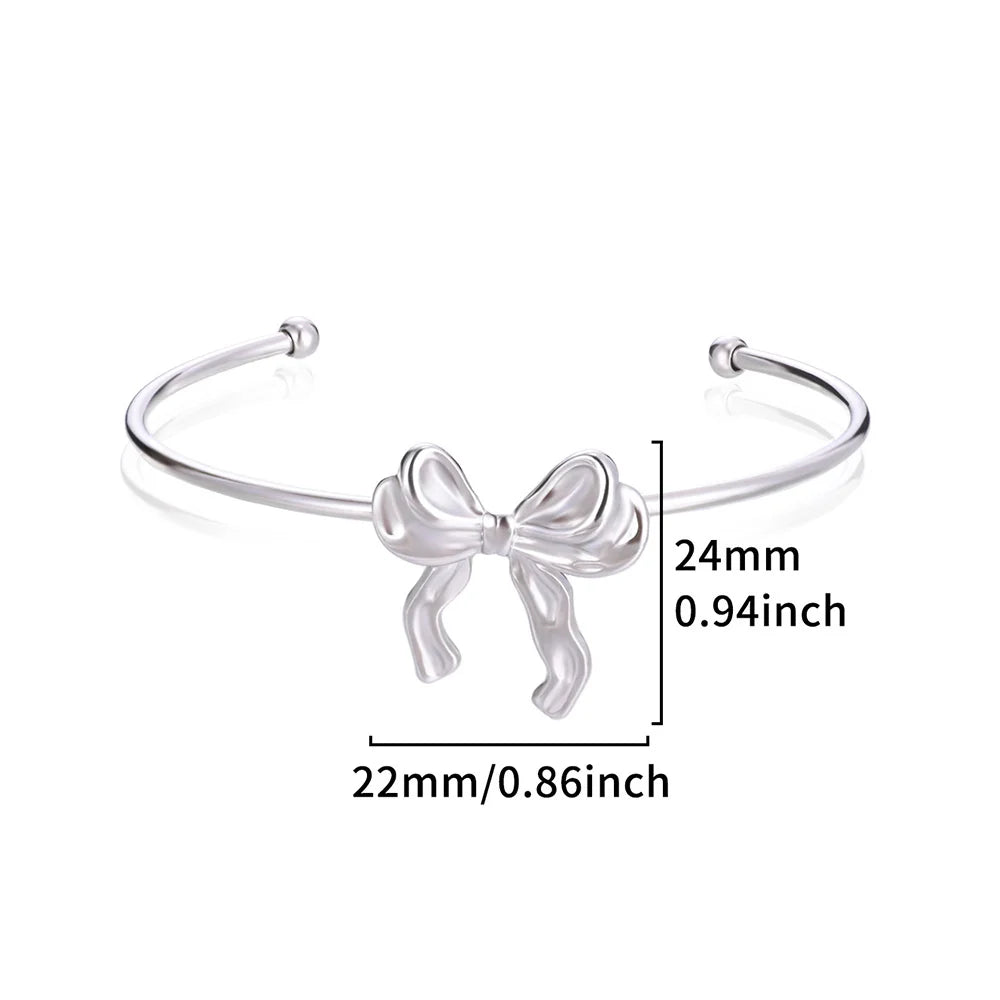 Liveify silver bow bangle bracelet with 24mm x 22mm dimensions, sleek and elegant design
