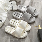 Liveify white and gray home slippers with breathable holes, soft material, and stylish design for comfort.