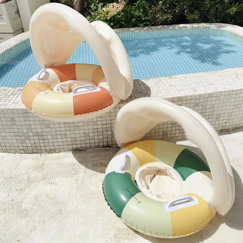 Liveify inflatable baby pool float with canopy, colorful striped design, soft fabric seat, poolside use