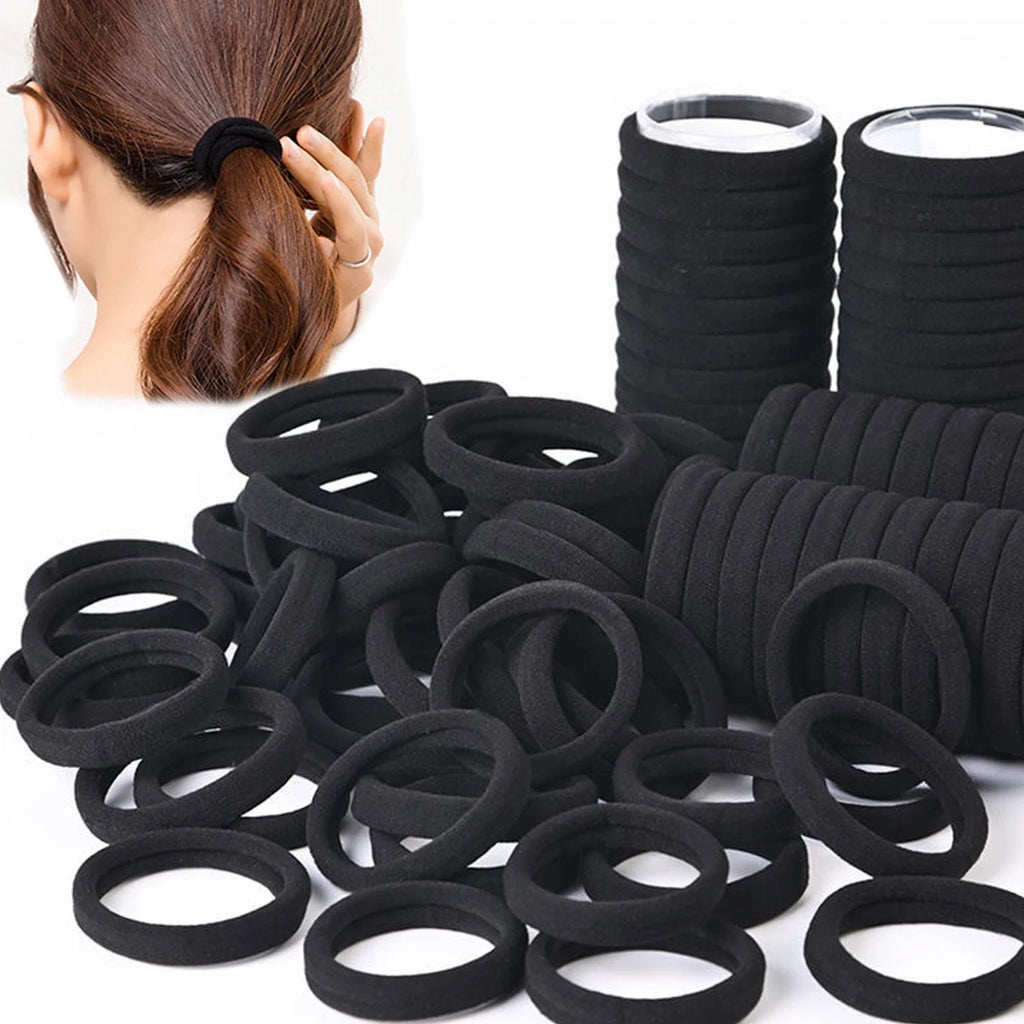 Liveify black velvet hair ties for ponytails, soft elastic scrunchies shown in bulk with model wearing one
