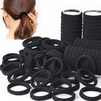 Liveify black velvet hair ties for ponytails, soft elastic scrunchies shown in bulk with model wearing one
