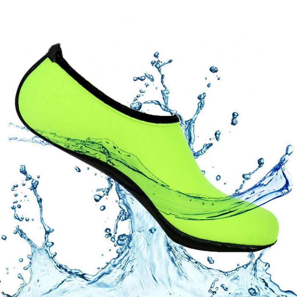Liveify neon green water shoe with black trim, splashing in water, lightweight and flexible design