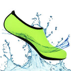 Liveify neon green water shoe with black trim, splashing in water, lightweight and flexible design