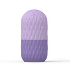 Liveify purple textured silicone travel bottle with wave pattern and max fill line