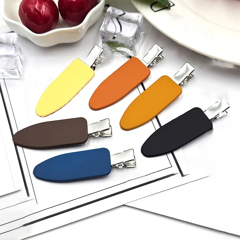 Liveify matte finish hair clips in yellow, orange, mustard, brown, blue, black with silver metal clasp