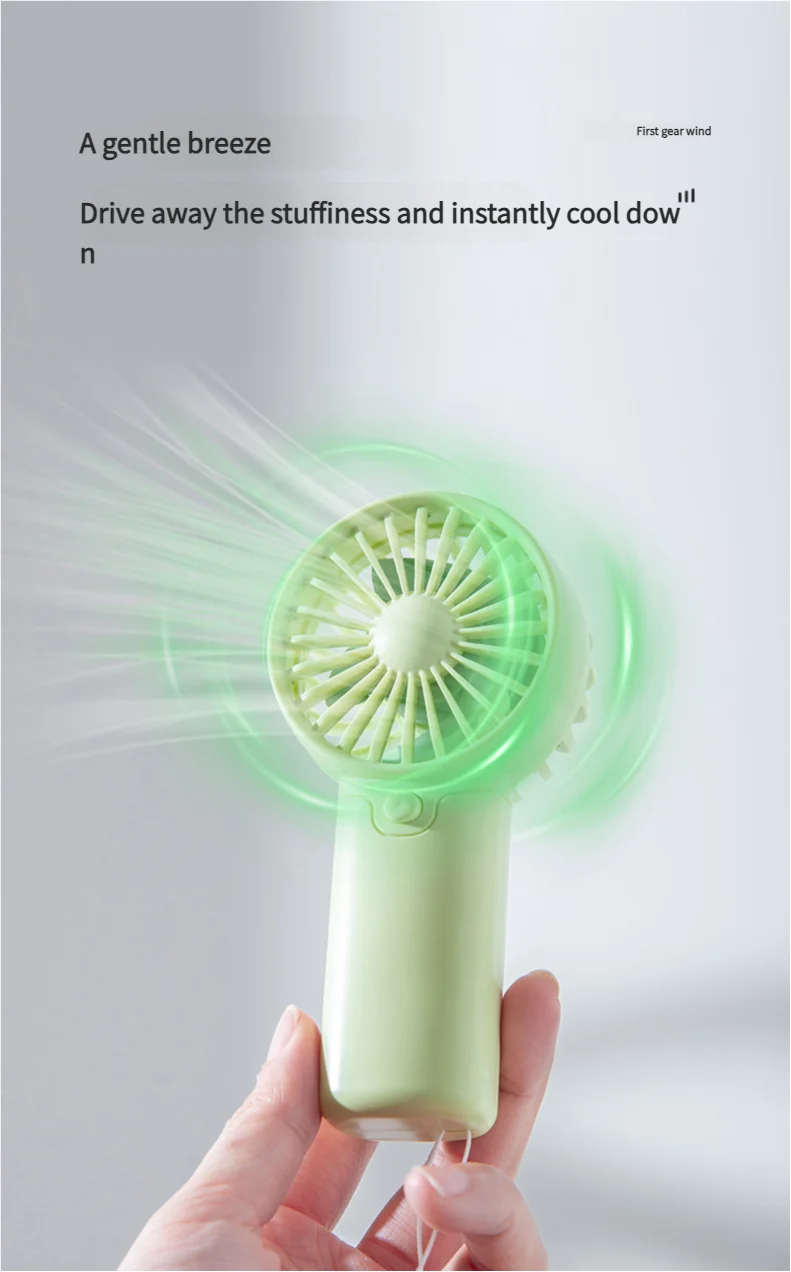 Liveify mint green handheld USB fan with gentle breeze, portable design for instant cooling