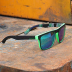 Liveify polarized sunglasses with neon green frames, blue mirrored lenses, and patterned arms on rustic metal