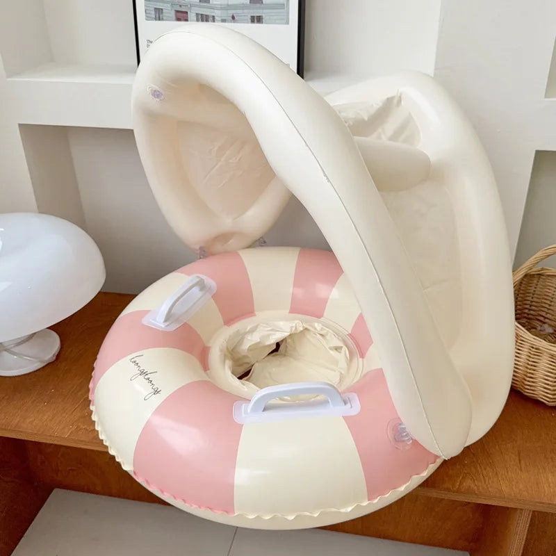 Liveify pink and cream striped inflatable pool float with canopy and handles, soft vinyl material for kids