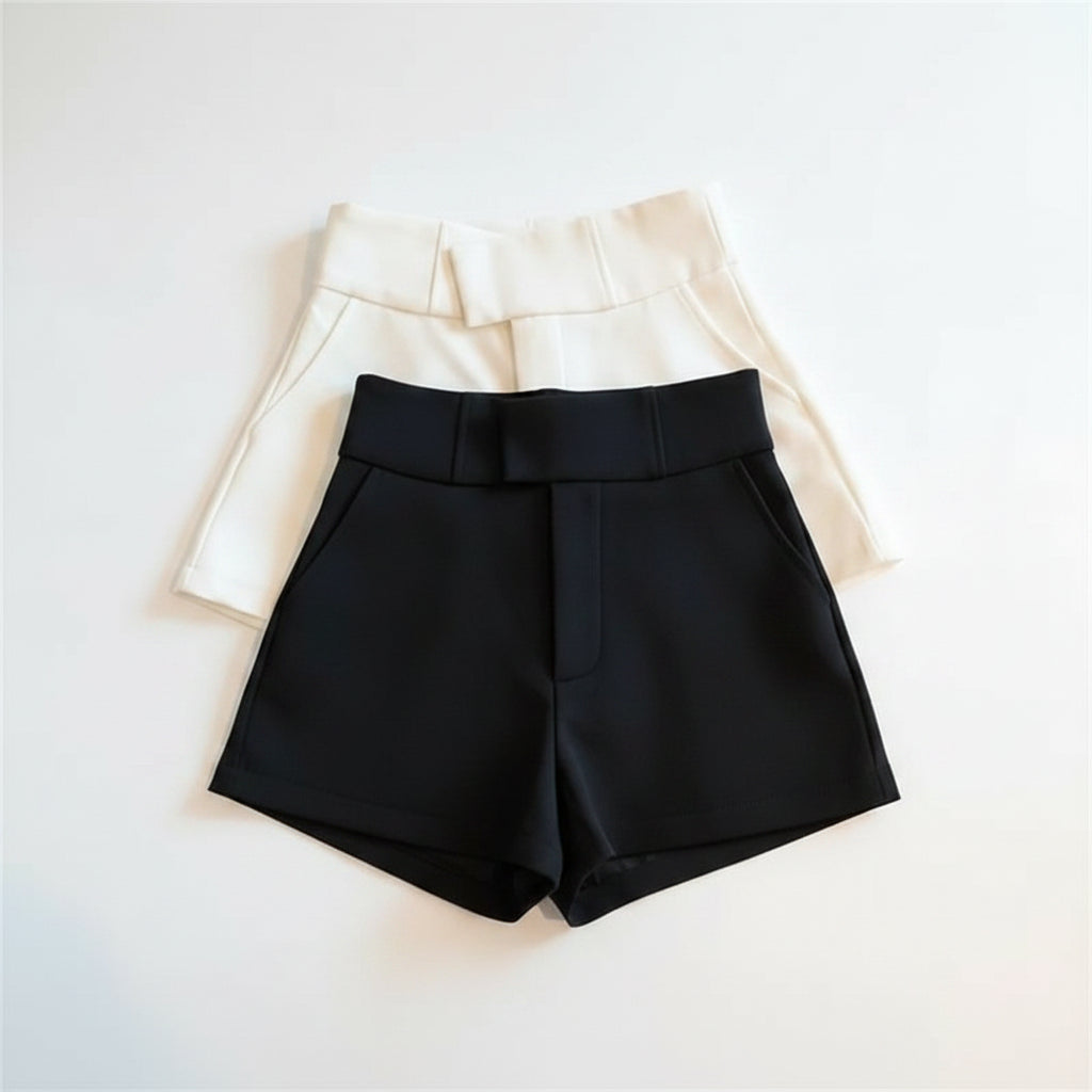 Liveify black and white high-waisted shorts with belt detail, stylish and modern design
