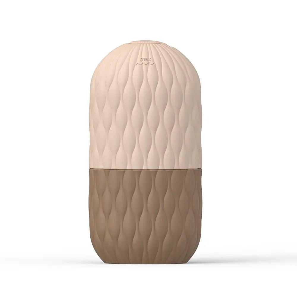 Liveify beige and brown textured silicone travel bottle with wave pattern and max fill line
