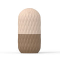 Liveify beige and brown textured silicone travel bottle with wave pattern and max fill line
