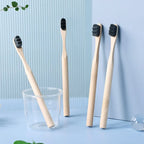 Liveify bamboo toothbrushes with black bristles, natural wood handles, eco-friendly design for daily oral care