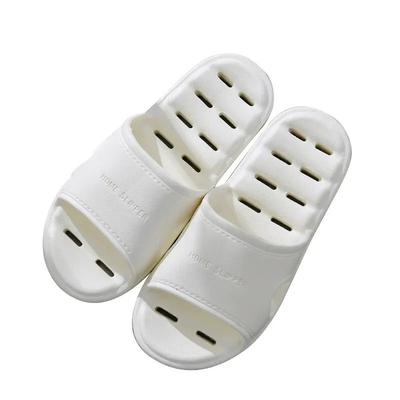 Liveify white home slippers with breathable holes and soft material for indoor comfort